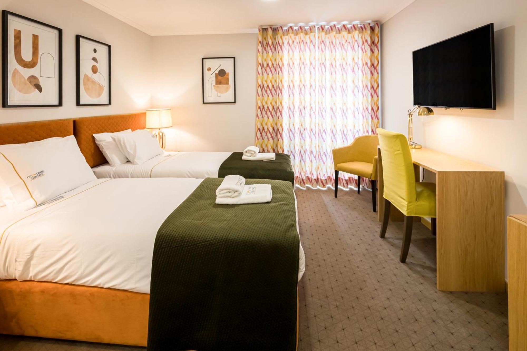 Chambre Deluxe Double ou Lits Jumeaux